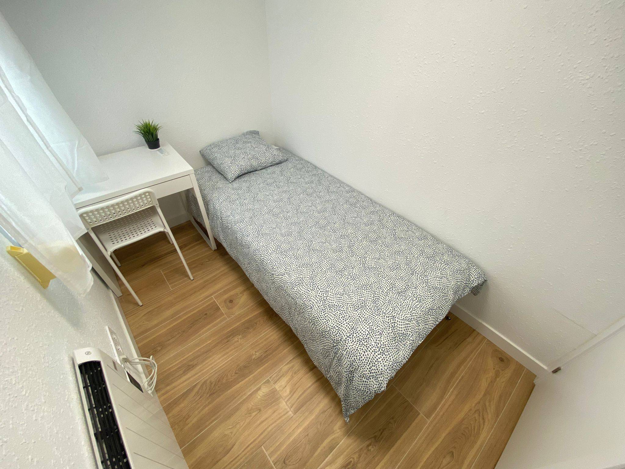 Habitación privada V en Avenida de la Albufera 2/14